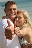 Couple with thumbs-up