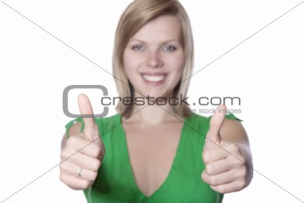 young woman gives thumbs up