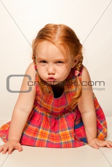 Little girl with a red dress on