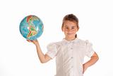School girl holding a globe