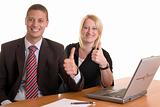Businessman and businesswoman expressing success with thumb up