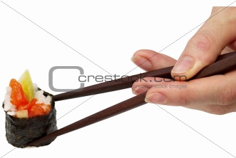 Roll with salmon in chopsticks (path isolated)