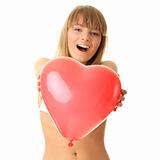 Woman in bikini with heart shaped baloon