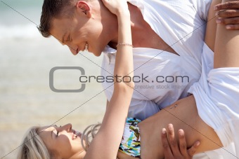 Couple enjoying at the beach
