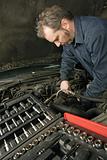 Mechanic repairing an engine