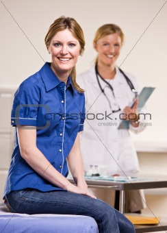 Woman sitting in doctorÕs office