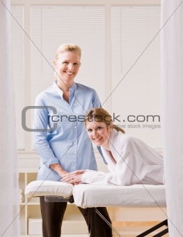 Woman and massage therapist