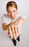 Woman displaying engagement ring