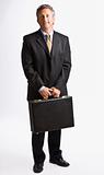 Businessman carrying briefcase