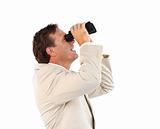 Handsome businessman searching for something with binoculars