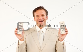 Friendly businessman holding dollars 