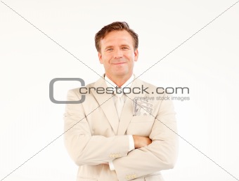 Handsome businessman with folded arms looking at the camera