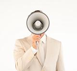 Caucasian businessman using a megaphone 