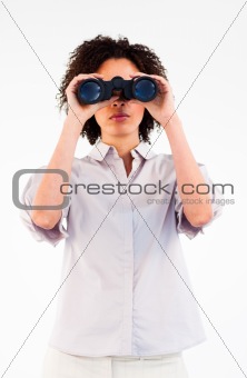 Young Afro-American businesswoman using binoculars