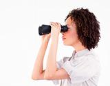 Portrait of attractive businesswoman using binoculars