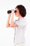 Sideways portrait of businesswoman with binoculars