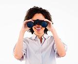 Close-up of Afro-American businesswoman holding binoculars 