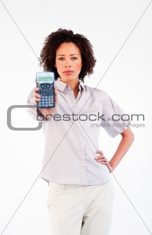 Confident brunette businesswoman holding a calculator