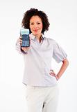 Afro-American businesswoman holding a calculator