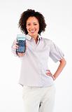 Smiling businesswoman holding a calculator