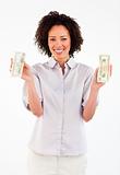 Smiling brunette businesswoman holding dollars