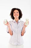 Smiling businesswoman holding dollars and looking upwards