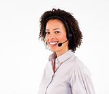 Smiling african operator working with headset