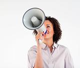 Businesswoman shouting through megaphone 
