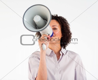 Businesswoman yelling through megaphone 