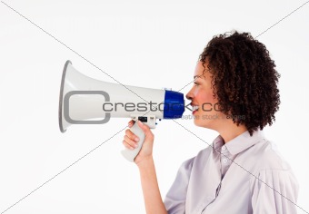 Businesswoman speaking through megaphone 
