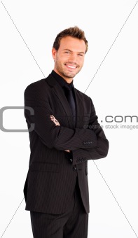 Smiling businessman with crossed arms 