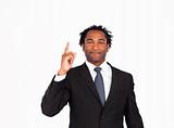 Afro-american businessman pointing upwards 