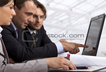 three business people working