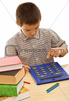 Schoolboy with calculator