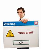 Businessman with computer virus alert