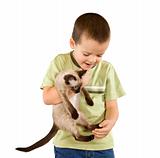 Little boy carrying his cat