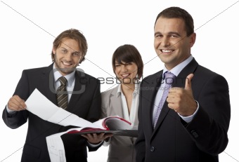three businesspeople thumb up
