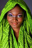 Smiling African woman with headwrap