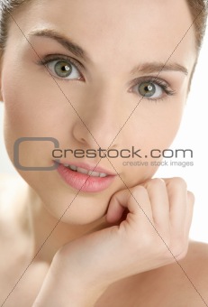 Beautiful woman portrait with hands on head