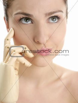 woman portrait thinking with mannequin hand