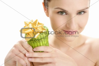 Beautiful woman portrait with a gift