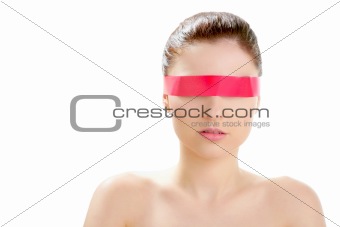 Beautiful cosmetic woman, red tape in eyes