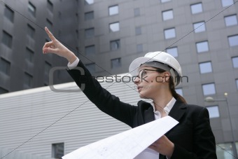 architect woman working outdoor with buildings