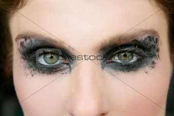 Green eyes woman, black makeup eye shadow