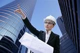 architect woman working outdoor with buildings