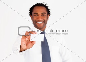 Afro-american businessman showing his card, focus on fingers and card 