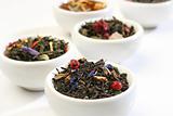 Various bowls of premiun tea leaves blends