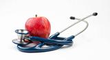 Stethoscope and an apple