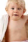 Happy baby with towel