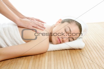 Beautiful woman on spa massage on back